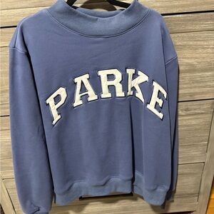 Parke mockneck sapphire with white. L/XL never worn